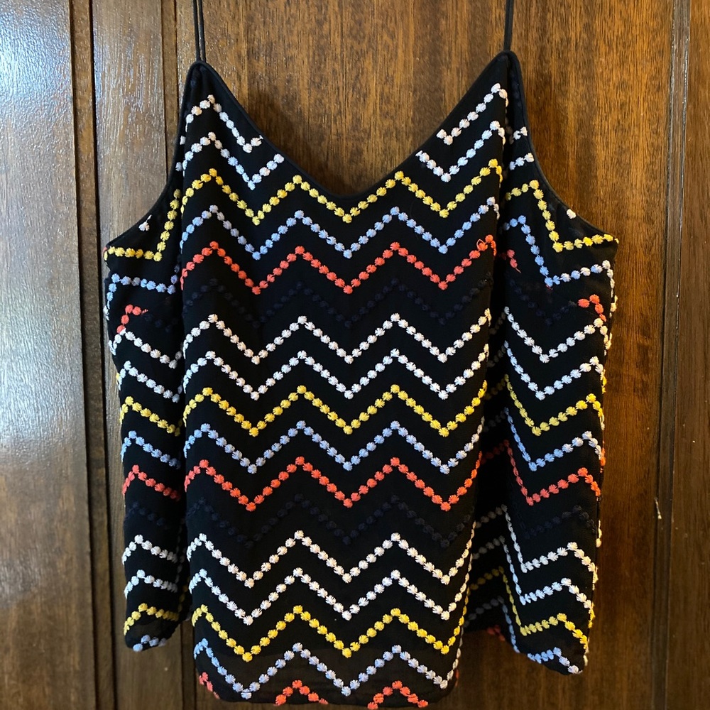 Navy tank with chevron stitching.